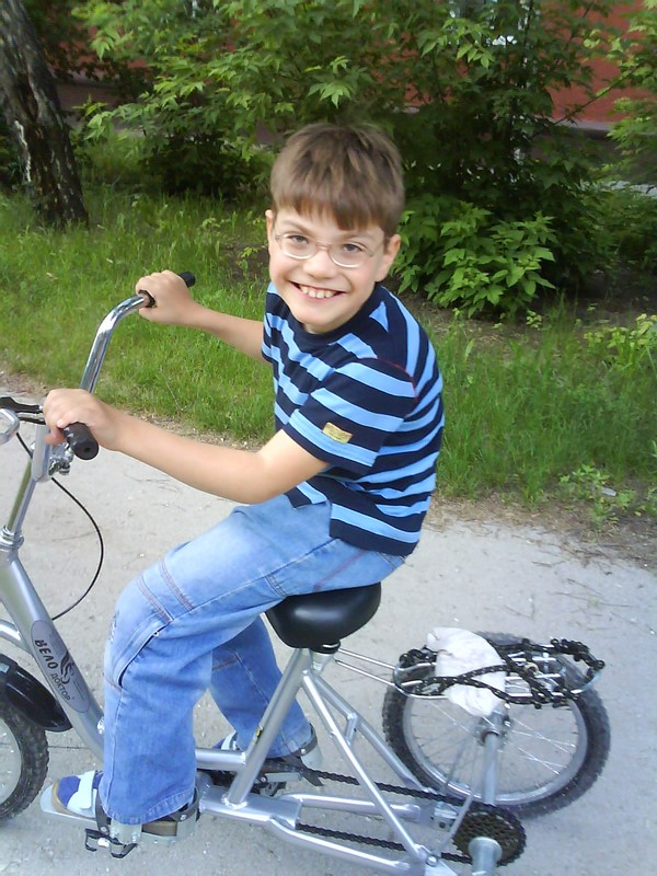 Vlad on the medicinal bike bought on the raised money